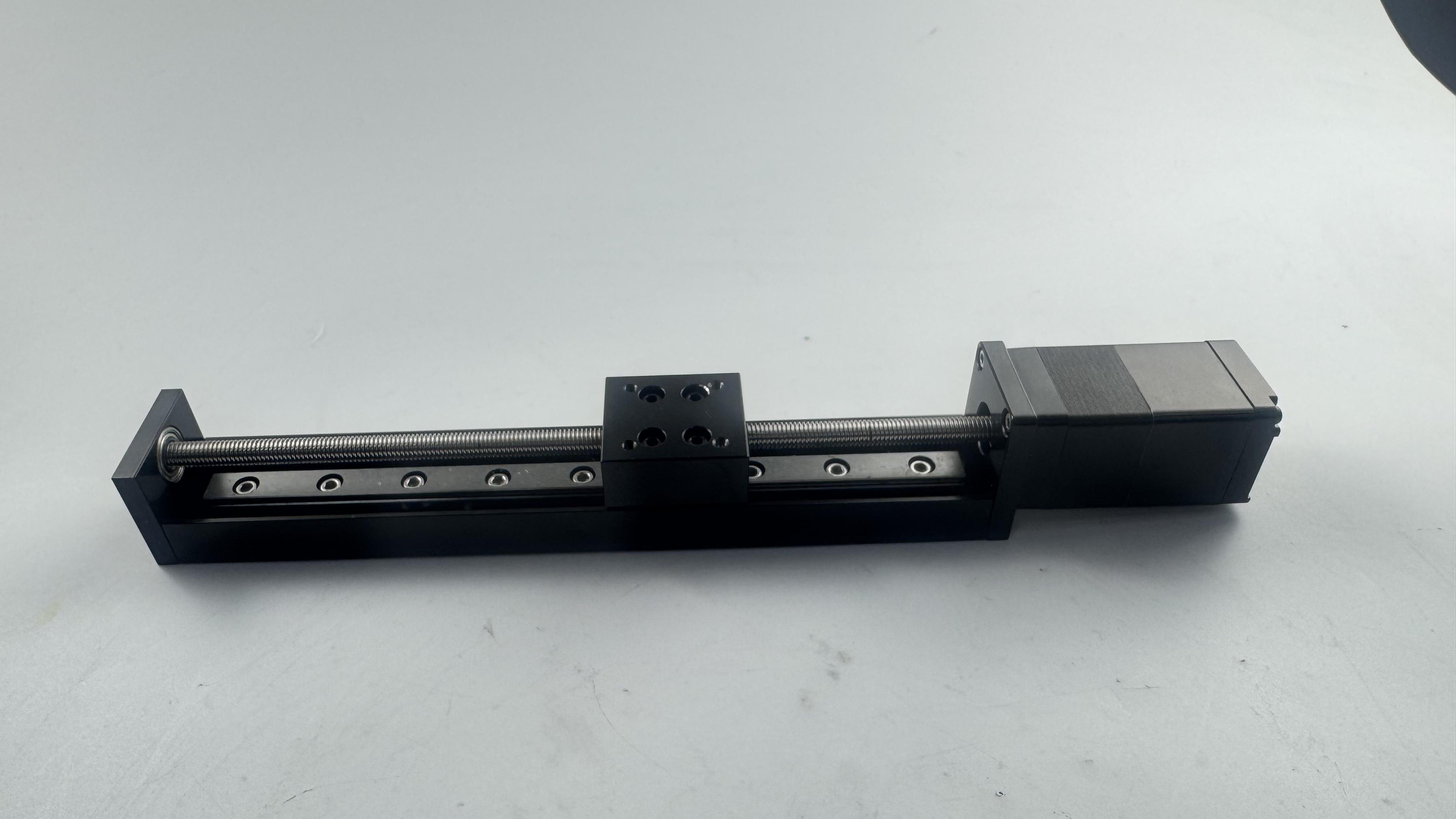 Linear actuator module with integrated stepper motor and precision lead screw